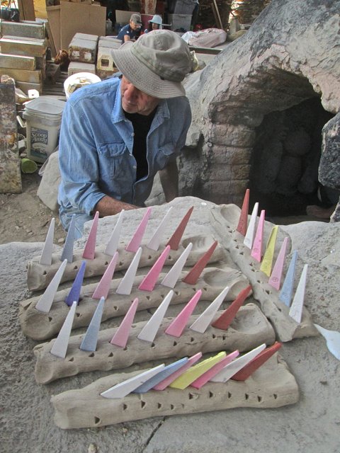 These cones all melt at different temperatures and act as somewhat of a thermostat during the firing.