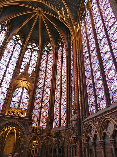 Sainte Chappel is known for its 50' stained glass windows and for being built with steel supports instead. of flying buttresses
